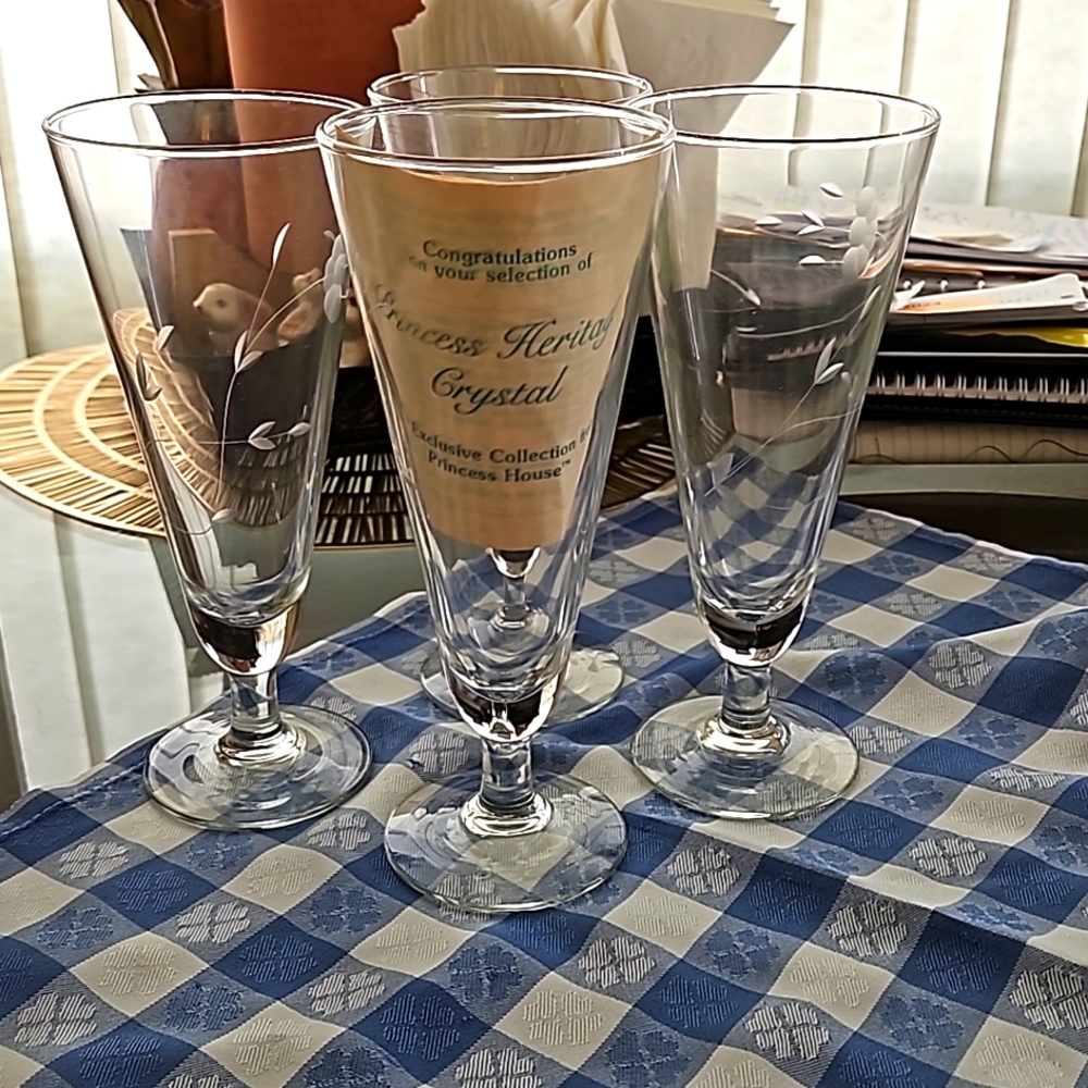 Set of 4 like new Princess House etched heritage pilsner glasses.